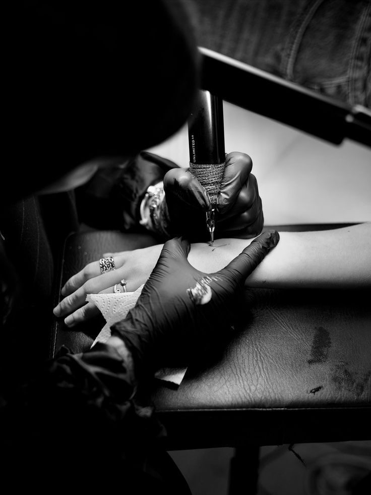 Tattoo artist at work